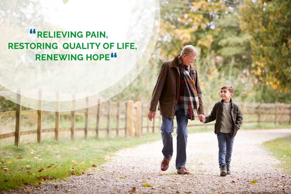 A Man And Child Walking On A Path